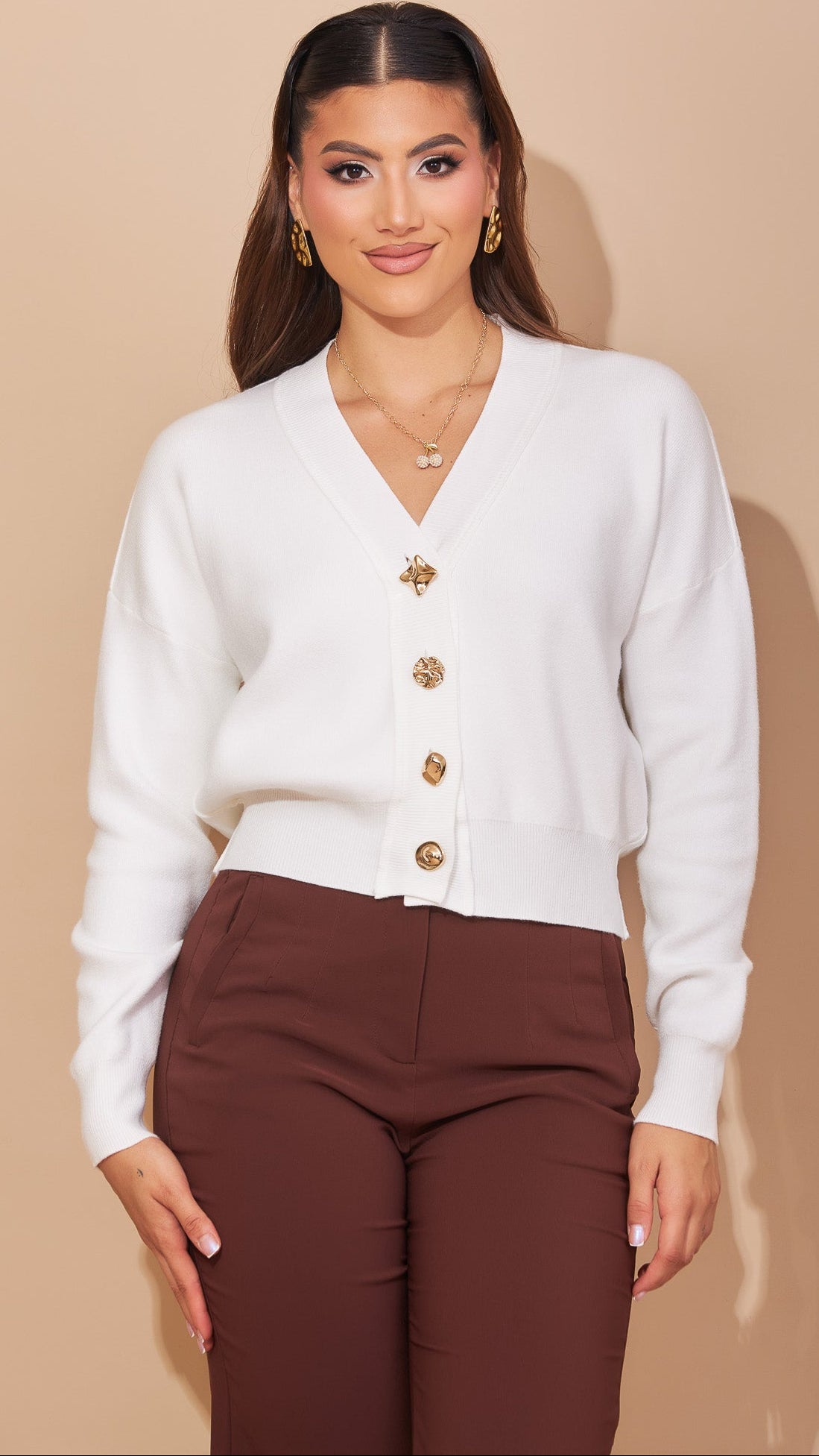 Suéter blanco botones dorados