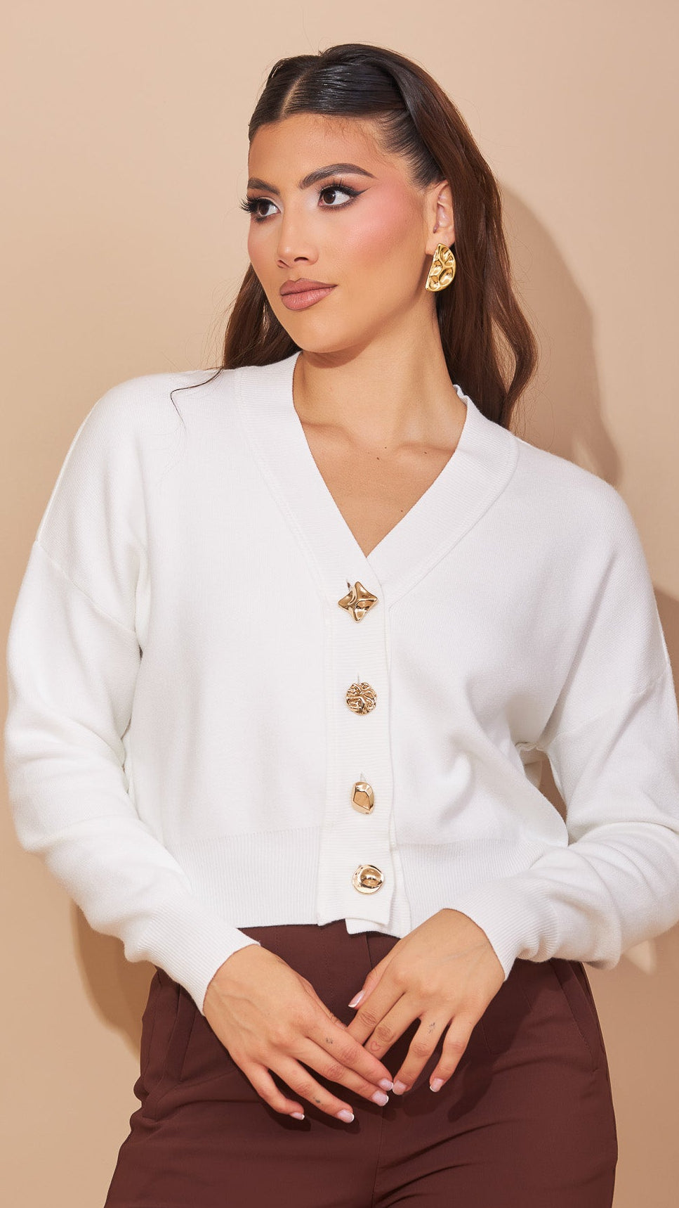 Suéter blanco botones dorados