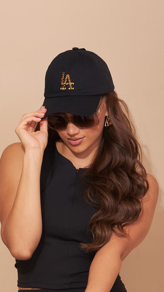 Gorra negra c/animal print