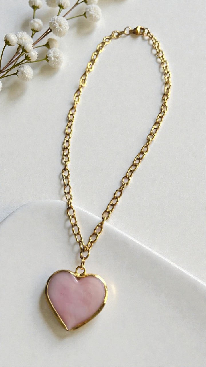 Collar baño oro con dije de corazón en tono rosado