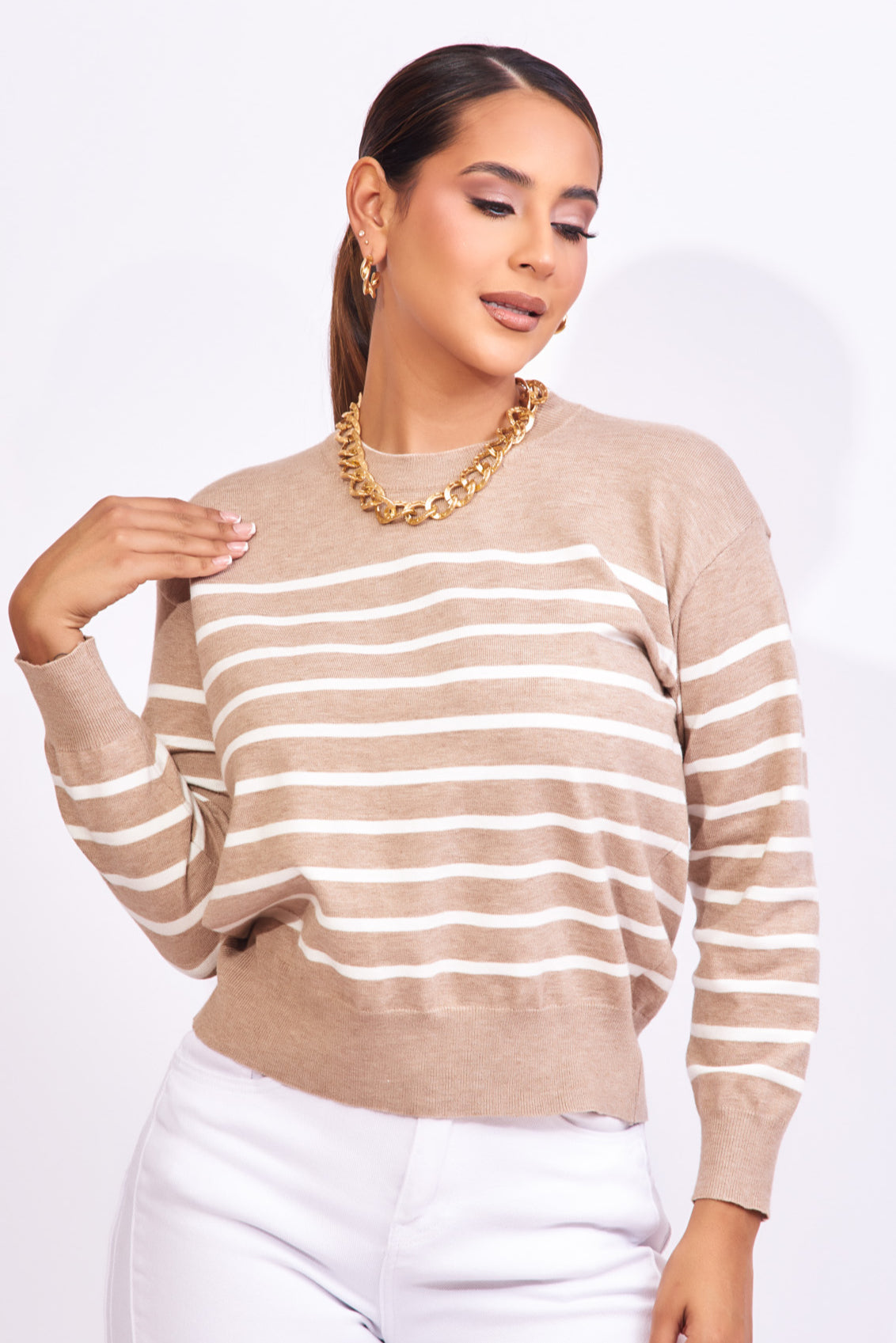 Suéter beige con rayas