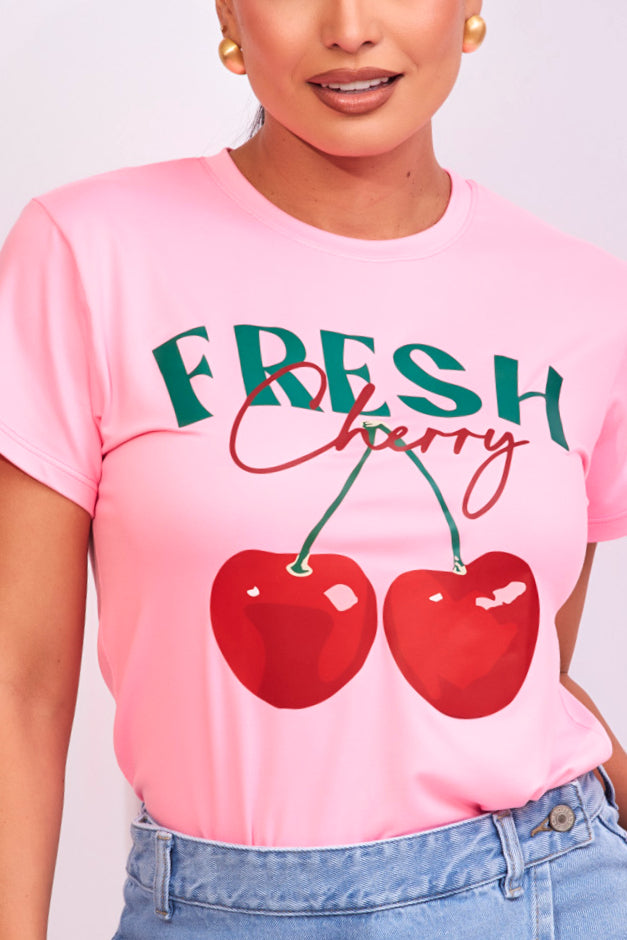Camiseta en rosado neón con aplique cherry