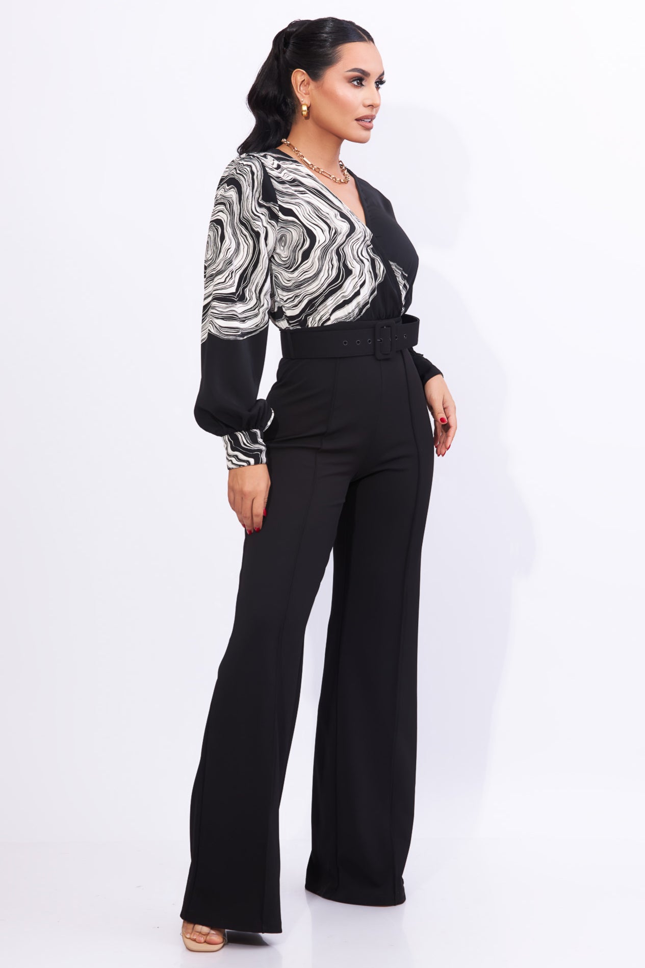 Enterizo negro manga larga con detalles en blanco